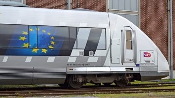 How can transport infrastructure be used to connect Europe socially and economically?